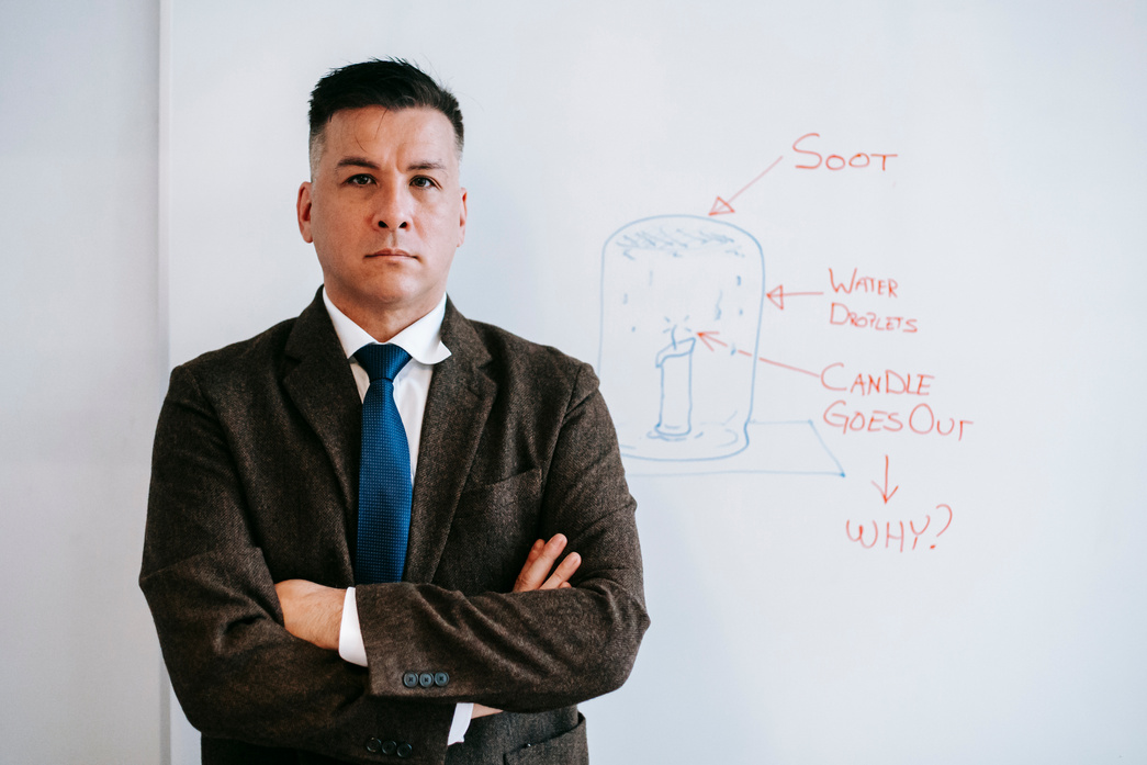 Photo Of Man Wearing Corporate Attire In Front Of White Board